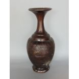 Antique Chinese bronze baluster bottle neck vase, embossed with animals amidst scrolled foliage,