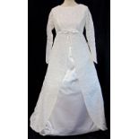 Tailor made vintage wedding dress from 1969 in white lace and satin with fitted bodice, high