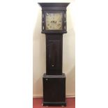 A Georgian oak longcase clock, the square hood enclosing a square painted dial and 30 hour