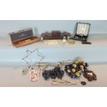 A mixed collection of interesting items to include a cased silver egg cup and spoon, further