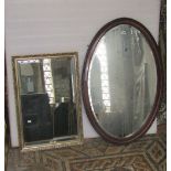 1930s mahogany oval wall mirror with bevelled edge mirror plate and a further small gilt framed