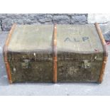 Two vintage travel trunks with canvas skins and timber lathes