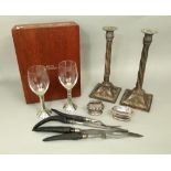 A good pair of Sheffield plated candlesticks with bamboo fluted stems and stepped circular bases,