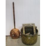 A circular pail with swing handle, a further copper example with swing handle, a hammered ewer,