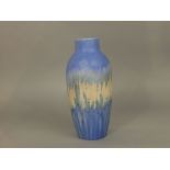 A Ruskin pottery vase by William Howson Taylor, with iron filing frosted type detail on a mottled