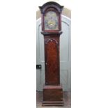 An 18th century walnut longcase clock, the front elevation with well figured detail, the door of