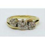 9ct crossover style ring set with a diamond triple floral cluster, size M, 3.1g