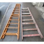 A large vintage wooden folding step ladder with reeded treads, together with a further large trestle