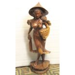 Eastern hardwood figure of a female wearing a coolie hat and holding a basket of flowers, 110cm