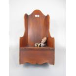 Antique fruitwood child's or dolls rocking chair with hinged commode seat, 65cm high; together