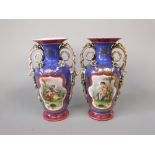 A pair of late 19th century continental blue ground vases with painted decoration of lovers and a