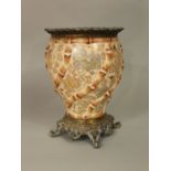 An unusual late 19th century Satsuma vase with wrythen moulded simulated bamboo detail and painted