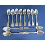 A mixed collection of twelve Irish Georgian and later fiddle pattern dessert spoons each engraved