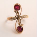 Impressive antique ruby and rose cut diamond ring of stylised crossover form, in unmarked gold, size