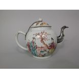 A 19th century Chinese porcelain teapot, enamelled with figures in a garden setting, silver spout,