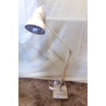 A Herbert Terry angle poise table lamp with cream colourway, two step platform base