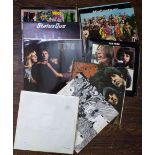 A quantity of vinyl LPs including The White Album, Revolver and Rubber Soul all by the Beatles,