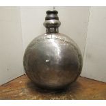 A large polished tin flask of cylindrical form with timber stopper 75 cm high