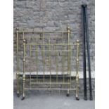 A Victorian brass bedstead with turned supports to accept a 3ft 6 mattress