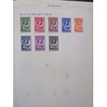 Mint and used GB Commonwealth and world stamps in four albums