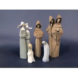 Two Lladro Daisa matt glazed figure groups of hooded monks, 38cm high max, together with a Lladro