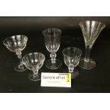 A large collection of glasses to include a 1953 coronation goblet with latticino glass stem and