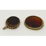 9ct swivel fob set with bloodstone and carnelian verso, together with a yellow metal agate brooch of