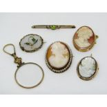 Group of five brooches to include two 9ct cameo examples and an indistinctly marked paste set bar