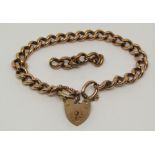 9ct rose gold curb link bracelet with heart padlock clasp, with six further links, 32.1g gross