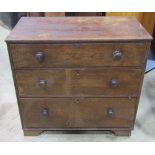 A small 19th century oak countrymade bedroom chest of three long graduated drawers raised on