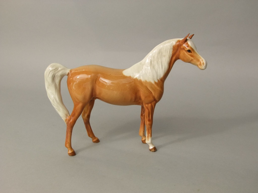 A Beswick group of a male and a foal raised on a moulded simulated grass base, together with two - Image 4 of 4