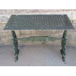 A good quality cast aluminium garden table, the rectangular top with decorative pierced detail