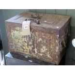 A 19th century cast iron portable strong box/safe, enclosed by a single door with panelled frame and