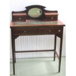An Edwardian mahogany ladies writing desk with inlaid chequered stringing, the shallow raised back