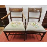 A set of seven (5+2) 19th century mahogany dining chairs with reeded bar backs over drop in floral