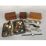 A mixed lot containing a collection of various vintage wristwatches, silver chain, costume