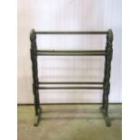 Two painted floor standing towel rails, with turned frames