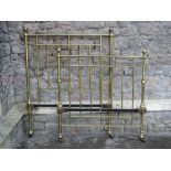 A Victorian brass single bedstead, with tubular frame and knob finials