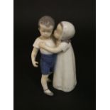 A B & G Copenhagen figure group of a pair of embracing children, 1914, 17.5cm approx