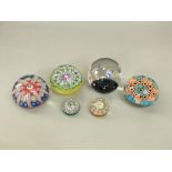 A collection of six Millefiori glass paperweights with various cane work decoration (6)