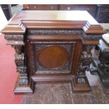 A good quality 19th century walnut pier cabinet, the central door with circular panelled centre,