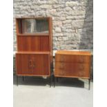 A Vanson mid 20th century teak floorstanding modular side cabinet enclosed by a pair of glazed