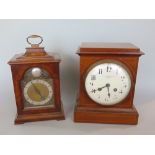 Goldsmiths & Silversmiths Co twin train inlaid walnut mantel clock, the bowed enamel dial with