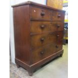 A Victorian mahogany veneered bedroom chest of two short over three long drawers, raised on squat