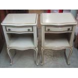 A pair of reproduction light green painted bedside lamp tables, the serpentine front fitted with a