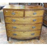 A Regency mahogany bow fronted chest of three long and two short drawers with caddy top, crossbanded