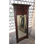A 19th century mahogany veneered on pine pier mirror, the rectangular plate flanked by split moulded