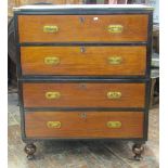 A 19th century mahogany chest in the military style, the two sectional carcass enclosing four long