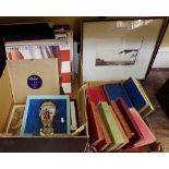 A mixed collection of items including misc books, vinyl LPs, two guitars, three framed prints by