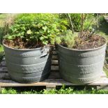 Four contemporary planters of varying design including a turquoise drip glazed and terracotta